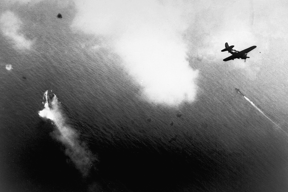 April 7, 1945, a Helldiver rolls in on its target, the Japanese battleship Yamato. (Corbis via Getty Images)