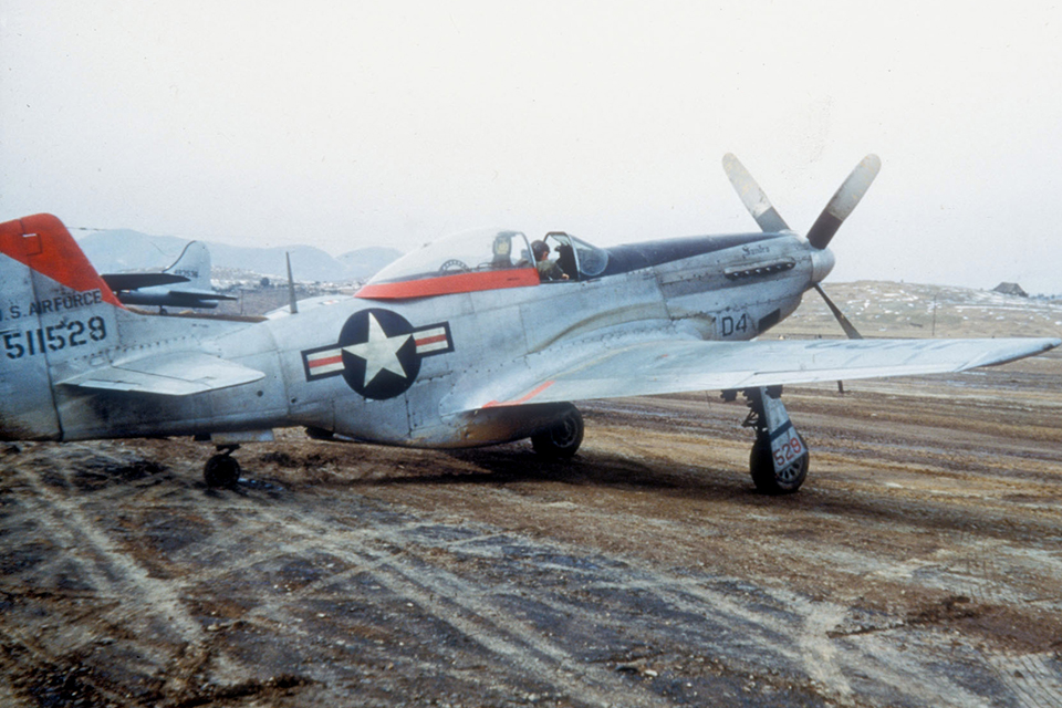 McGee flew 100 missions during the Korean War, flying F-51D Mustangs with the 67th Fighter-Bomber Squadron.