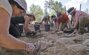 Students excavating, the future of archaeology